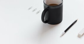 stockphoto of coffee mug and office utensils